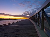 Foothpath during sunset  Foothpath during sunset on a newly built deck : Drenthe, Netherlands, New, Tynaarlo, architecture, architectuur, barge, beplanking, blauw, blue, boarding, color, colorful, colors, dark, deck, decks, dock, donkergrijs, footpath, geel, gray, grijs, groningen, hiking, holland, hout, houten, kleur, kleuren, kleurrijk, landscape, landschap, nederland, new neighborhood, nieuw, nieuwbouw, nieuwbouwwijk, nieuwe, paars, pad, patio, planking, ponton, purple, road, rudmer zwerver, steiger, sunset, terras, vlonder, vlonders, walking, wandel, wandelen, wandelpad, water, watercourse, watergang, wood, wooden, yellow, zonsondergang