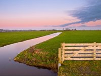 Gate to a meadow  Gate to a meadow in dutch rural landscape during sunset : Netherlands, Wierum, Winsum, agricultural, agriculture, atmosphere, autumn, blue, canal, color, creative nature, dawn, ditch, dusk, dutch, entrance, environment, fence, field, gate, grass, green, groningen, holland, landscape, meadow, meadow area, mood, natural, nature, nobody, pink, purple, reflection, river, rudmer zwerver, rural, sky, sunrise, sunset, water, water management, waterway