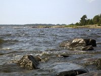 Oever van het Vanernmeer  Bank of Lake Vanern, Säffle, Dalsland, Sweden : Europe European, Lake Vanern, Saffle Dalsland, Scandinavia Scandinavian, Sweden Swedish, bank shore, color, colour, horizontal, lake, nature natural, rock rocky, rural landscape, summer, water, wave