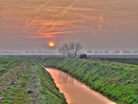 HDR image of a sunset  HDR image of a sunset influenced by contrails : Netherlands, airplane, airspace, architecture, architectuur, atmosphere, avond, blauw, blue, boom, bouw, canal, condensatie spoor, condensation trail, condensstreep, congested, construction, contrail, crane, creative nature, crossing, crowded, dageraad, damp spoor, dawn, ditch, dramatic, dramatisch, druk, dusk, evening, field, geel, gras, grass, green, groen, groningen, holland, jet trail, kanaal, kraan, kruising, landelijk, landscape, landschap, lucht, luchtruim, main, nederland, onstwedde, orange, oranje, plane trail, pollution, red, river, rivier, rood, rook, rudmer zwerver, rural, schemering, sfeer, sky, sloot, smoke, spoor, summer, sunrise, sunset, traffic, vapor trail, veld, verkeer, verstopte, vervuiling, vliegtuig, vliegtuig spoor, voornaamste, water, yellow, zomer, zonsondergang, zonsopgang