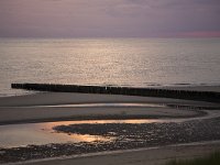 Beach with groin during sunset, Haamstede, Zeeland, Netherlands  Beach with groin during sunset, Haamstede, Zeeland, Netherlands : Dutch, Haamstede, Holland, Netherlands, beach, coast, evening, quiet, rural landscape, sand, sandy, sea, setting sun, shore, shoreline, summer, sunset, twilight, warm red, water, Europe, European, groin, groyne, natural, nature, summertime, tranquil, tranquillity