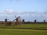 Windmills of Unesco World Heritage Site Kinderdijk, South Holland, Netherlands  Windmills of Unesco World Heritage Site Kinderdijk, South Holland, Netherlands : blue sky, building, canal, destinations, europe, european, historic, Holland, Kinderdijk, monument, Netherlands, reed, South Holland, travel, unesco world heritage site, windmill, dutch, dutch culture, heritage site, history, non-urban scene, rural, rural landcape, rural scene, the past, unesco, water management, world heritage site, architecture, cloud, clouded sky, clouds, countryside, grass, grassland, green, meadow, pasture