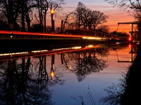 night image of a drawbridge  Long exposure night image of a drawbridge in rural dutch landscape : Netherlands, afternoon, architecture, autumn, blue, bridge, building, canal, car, dawn, drawbridge, dusk, dutch, evening, holland, landscape, light, lights, long exposure, modern, night, outdoor, red, river, sky, sunrise, sunset, thiny, water, waterway, winter