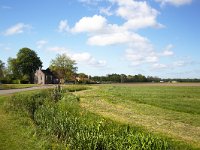 Typical rural landscape of southwestern part of Dutch province Friesland  Typical rural landscape of southwestern part of Dutch province Friesland : agricultural, agriculture, cloudscape, europe, european, farmland, grass, grassland, Holland, landscape, meadow, pasture, room, rural, sky, skyscape, field, no people, nobody, outdoors, outside, Sleat, ditch, farm, farmhouse