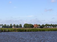 Typical landscape with lakes of Dutch province Friesland  Typical landscape with lakes of Dutch province Friesland : sky, skyscape, cloud, clouds, cloudscape, outside, outdoor, landscape, rural landscape, countryside, rural scene, non-urban scene, lake, water, land, Friesland, Frylan, Dutch, Holland, Netherlands, Europe, European, no people, nobody, summer, summertime, spring, springtime, room, recreation, reed, relaxationfarm, farmland, waves, horizon, horizon over land