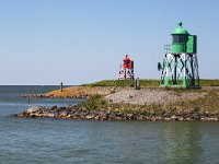 Harbor lights at the entrance of harbor of Stavoren, Friesland, Netherlands : city, Europe, European, Friesland, Dutch, Fryslan, hansa city, Holland, Netherlands, Starum, Stavoren, town, 2, blue sky, couple, dam, dike, entrance, green, harbor, harbour, light, lights, no people, nobody, outdoor, outdoors, outside, red, safety, summer, summertime, two, water