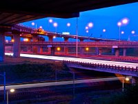 Busy traffic intersection  Busy traffic intersection during rush hour by night : Netherlands, Prince Claus square, a12, a4, achterlichten, asfalt, asphalt, autoweg, avond, beton, beweging, blur, break, breken, bridge, bridges, brug, bruggen, concrete, congestie, congestion, crossing, dark print, de spits, den haag, donker, druk, dutch, europe, european, fence, file, gras, grass, guardrail, handrail, hek, highway, holland, intersection, junction, kruising, landscape, landschap, leuning, lights, motor way, move, nacht, nederland, night, onscherpte, overpass, overpasses, prins claus plein, railway, rear, rudmer zwerver, rush hour, safety, schemer, snelheid, snelweg, speed, speed way, spoorweg, straatlantaarns, straatverlichting, street lighting, street lights, the hague, traffic, twilight, vangrail, veiligheid, verkeer, verlicht, viaduct, viaducten