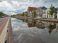 Central canal in the city of Assen Netherlands  Central canal in the city of Assen Netherlands : Assen, Central, Drenthe, amsterdam, architecture, architectuur, blue, boat, bomen, bouw, bricks, building, buiten, canal, capital, centrum, city, creative nature, dorp, dutch, europe, european, fishing, flag, front, geschiedenis, gracht, harbour, haven, hemel, historic, historisch, historische, history, holland, hoofdstad, hoofdvaart, house, huis, kanaal, landscape, landschap, market, muur, nederland, nederlands, noord, noorden, north, old, oud, outside, plaats, place, reizen, rijkdom, river, rivier, rudmer zwerver, sail, sailor, schip, ship, shops, sky, small, south, stad, stadsbeeld, style, sun, sunset, toerisme, tourism, town, traditie, tradition, traditional, traditioneel, traffic, travel, trees, vaart, verkeer, village, vintage, wall, water, watergang, waterloop, wealth, weg, winkels, zon, zonsondergang