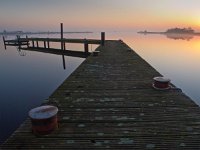 Bent jetty with mooring post  Bent jetty with mooring post during sunset over lake : Noordenveld, aanlegsteiger, afmeren, atmosphere, autumn, bent, bollard, calm, creative nature, dageraad, dawn, dusk, dutch, gebogen, geel, herfst, holland, hoogtezon, houten, jetty, kalm, lake, lakeside, landing stage, landscape, landschap, leek, leekstermeer, lente, licht, light, lucht, matsloot, meer, mist, mooring, natural, nature, natuur, natuurlijk, nederland, nederlands, orange, oranje, paal, peace, pier, post, quiet, reflect, reflecteren, reflectie, reflection, rudmer zwerver, rustig, sandebuur, schemering, sereen, serene, sfeer, sky, spectaculaire, spectacular, spring, steiger, summer, sun, sunbeam, sunlight, sunray, sunrise, sunset, sunshine, tranquil, twilight, vredig, water, windstil, wooden, yellow, zomer, zon, zonlicht, zonneschijn, zonnestraal, zonsondergang, zonsopgang