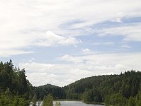 Landschap ZO van Halden, Noorwegen  Landscape of Norway, south-east of the town Halden : color, colour, Europe European, forest wood, Halden, lake, mountain, nature natural, Norway, norwegian, rural landscape, Scandinavia Scandinavian, summer, tree, vertical, water