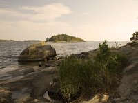 Oever van het Vanernmeer  Sunset along Lake Vanern, Säffle, Dalsland, Sweden : Europe European, Lake Vanern, Saffle Dalsland, Scandinavia Scandinavian, Sweden Swedish, bank shore, color, colour, horizontal, lake, nature natural, rock rocky, rural landscape, summer, sunset evening, water