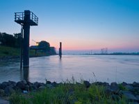 Bollards during sunset  Bollards during sunset over Rhine in Nijmegen, Netherlands : afmeren, atmosphere, blauw, blue, bollard, business, copy space, creative nature, dageraad, dawn, depressie, depression, dusk, dutch, economie, economy, electricity, elektriciteit, empty, energie, environment, flowing, gelderland, gras, grass, green, groen, handel, holland, industrial, industrie, industry, landscape, landschap, levering, lucht, meerpaal, milieu, mole, mood, mooring, nederland, nederlands, niemand, nijmegen, nobody, paal, plant, post, power, productie, production, recessie, recession, rijn, river, riverside, rivier, rudmer zwerver, schemering, sereen, serene, sfeer, sky, stemming, stream, stroom, summer, sunrise, sunset, supply, technologie, technology, trade, transport, transportation, vervoer, vloeiend, waal, water, waterway, waterweg, zomer, zonsondergang, zonsopgang, zonsopkomst