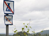 Geen tenten en caravans  Roadsigns no tents and no caravans, Torsby, Sweden : color, colour, countryside, forbid forbidden, lake water, no tent caravan, not allowed, rural, Europe European, Scandinavia Scandinavian, Sweden Swedish, vertical