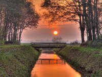 Sunset over bridge  Sunset over bridge and ditch in a park : Netherlands, atmosphere, bomen, boom, boston, bridge, brug, bruggetje, bum rudmer, calm, canal, creatief, creative, creative nature, dageraad, dawn, ditch, dramatic, dramatisch, dutch, field, geel, gras, grass green, groen, groningen, hemel, holland, kalm, kalmte, kanaal, landelijk, landscape, landschap, nature, natuur, nederland, nederlands, onstwedde, orange, oranje, peaceful, river, rivier, rudmer zwerver, rural, rust, schemering, sereen, serene, sfeer, sky, sloot, summer, sunrise, sunset, tranquility, tree, trees, twilight, veld, vredig, walking, wandelpad, water, yellow, zomer, zonsondergang, zonsopgang