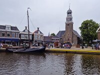Historic centre of aquatic sports village Lemmer, Friesland, Netherlands  Historic centre of aquatic sports village Lemmer, Friesland, Netherlands : lemmer, centre, historic, aquatic sports, village, water, Sylroede, Zeilroede, building, architecture, monument, gable, window, windows, door, front door, urban, urban scene, urban landscape, people, outside, outdoor, outdoors, season, summer, summertime, spring, springtime, firiesland, fryslan, dutch, holland, netherlands, europe, european, church, tower, ship, sailing ship, quay