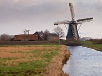 Traditional dutch windmill  Traditional dutch windmill in polder landscape : Netherlands, Polder, canal, cloud, ditch, dutch, field, grass, holland, landscape, mill, old, sky, traditional, vintage, water, water management, wind, windmill