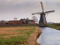 Traditional dutch windmill  Traditional dutch windmill in polder landscape : Netherlands, Polder, canal, cloud, ditch, dutch, field, grass, holland, landscape, mill, old, sky, traditional, vintage, water, water management, wind, windmill