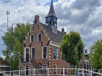 Townhall of Dutch village Balk, Friesland  Townhall of Dutch village Balk, Friesland : de friese meren, friesland, fryslan, netherlands, holland, dutch, europe, townhall, monument, historic, building, gable, step gable, tower, Balk, european, architecture, old, 17th century, bridge, canal, water, river, summer, summertime, de fryske marren