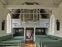 Interior with pews and organ of historic church of village Sandfirden, Friesland, Netherlands  Interior with pews and organ of historic church of village Sandfirden, Friesland, Netherlands : church, building, architecture, monument, historic, history, culture, destination, old, Sandfirden, Sudwest-Fryslan, Friesland, Fryslan, Dutch, Netherland, Europe, european, indoor, inside, interior, bank, banks, organ, pipe organ, window, dutch culture, travel destination, pew, pews