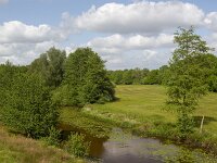 Restored landscape around Dutch river Ruiten Aa; Sellingen, Groningen, Netherlands  Restored landscape around Dutch river Ruiten Aa; Sellingen, Groningen, Netherlands : nature restoration, landscape restoration, restored, river, brook, ruiten aa, water, stream, tree, trees, wetland, countryside, rural, landscape, rural landscape, rural scene, non-urban landscape, non-urban scene, outside, outdoor, outdoors, no people, nobody, summer, summertime, spring, springtime, nature protection, protected area, nature, natural, sellingen, westerwolde, groningen, netherlands, holland, dutch, europe, european, grass, grassland, meadow, pasture, sky, clouded sky, clouds