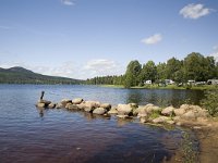 Ovre brocken, Torsby  Lake Ovre Brocken near Torsby with camping in the background, Värmland, Sweden : boulder dam, camp camping, color, colour, Europe European, horizontal, lake, mountain, nature natural, Ovre Brocken, rock rocky, rural landscape, Scandinavia Scandinavian, summer, Sweden Swedish, tent caravan, Torsby Varmland, water