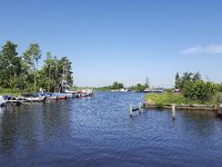 Small yacht harbor with sailing boats and dinghies  Small yacht harbor with sailing boats and dinghies : aquatic sport, blue sky, boat, boats, dinghies, dinghy, dutch, europe, european, friesland, frisian, harbor, holland, leisure, marina, netherlands, no people, nobody, outdoors, outside, recreation, rural, rural landscape, sailing, summer, summertime, water, water sports, yacht harbor