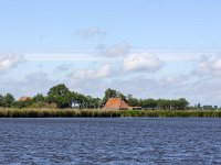 Typical landscape with lakes of Dutch province Friesland  Typical landscape with lakes of Dutch province Friesland : sky, skyscape, cloud, clouds, cloudscape, outside, outdoor, landscape, rural landscape, countryside, rural scene, non-urban scene, lake, water, land, Friesland, Frylan, Dutch, Holland, Netherlands, Europe, European, no people, nobody, summer, summertime, spring, springtime, room, recreation, reed, relaxationfarm, farmland, waves, horizon, horizon over land