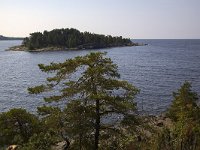 Oever van het Vanernmeer  View on Lake Vanern, Säffle, Dalsland, Sweden : lake, Lake Vanern, rural landscape, summer, water, Europe, European, bank, island, natural, nature, rock, rocky, Saffle Dalsland, Scandinavia, Scandinavian, shore, summertime, Sweden, Swedish, tree, trees, Vanern