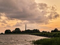 View at sunset of Lake IJssel off the coast near  Dutch village Lemmer, Friesland  View at sunset of Lake IJssel off the coast near  Dutch village Lemmer, Friesland : lake IJssel, IJsselmeer, coast, sky, cloud, clouds, cloudy, sky scape, nature, natural, rural, landscape, rural landscape, rural scene, non-urban landscape, non-urban scene, outside, outdoor, outdoors, no people, nobody, summer, summertime, spring, springtime, europe, european, netherlands, holland, dutch, Friesland, Fryslan, Lemmer, beach, sunset, setting sun, evening, warm, romantic, colorful