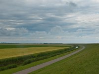 Dramatic sky  Dramatic sky above typical dutch rural landscape : Netherlands, agriculture, akker, akkerbouw, creative nature, dijk, dike, dreigend, dreigende, eemshaven, eemsmond, field, gras, grass, green, groen, groningen, holland, landscape, landschap, lucht, menacing, moody, nederland, noorden, north, rudmer zwerver, seawall, sky, storm, stormachtig, stormy, summer, threatening, zeedijk, zomer